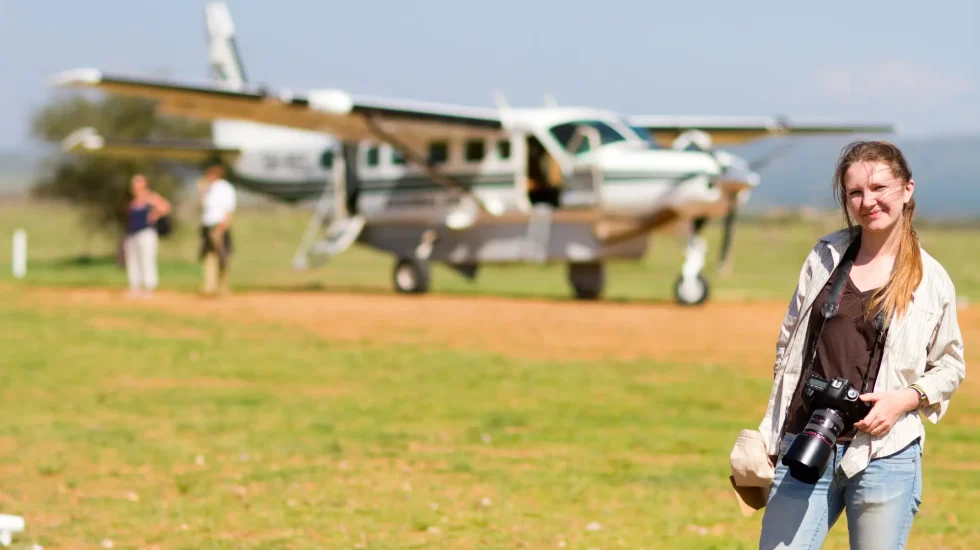female photographer at airport in Tanzania